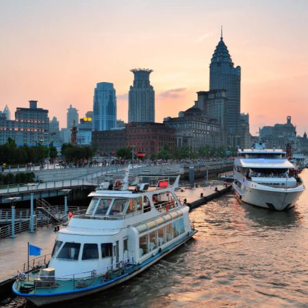 boat-huangpu-river-with-shanghai-urban-architecture-sunset (1)